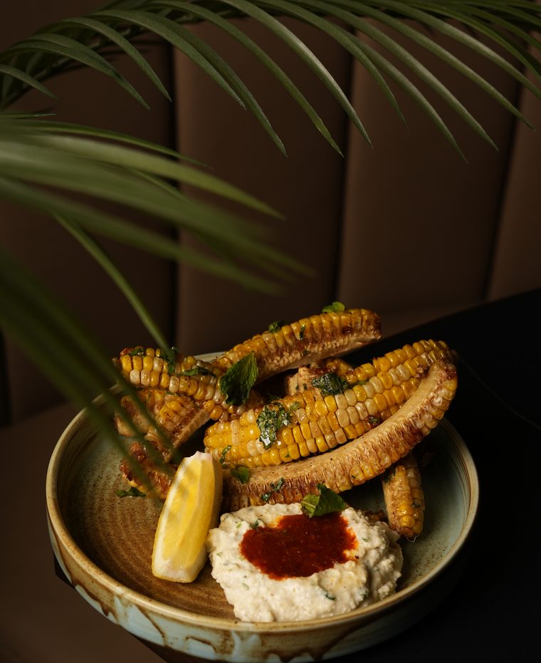 Crispy corn ribs with whipped paneer and smoky sauce