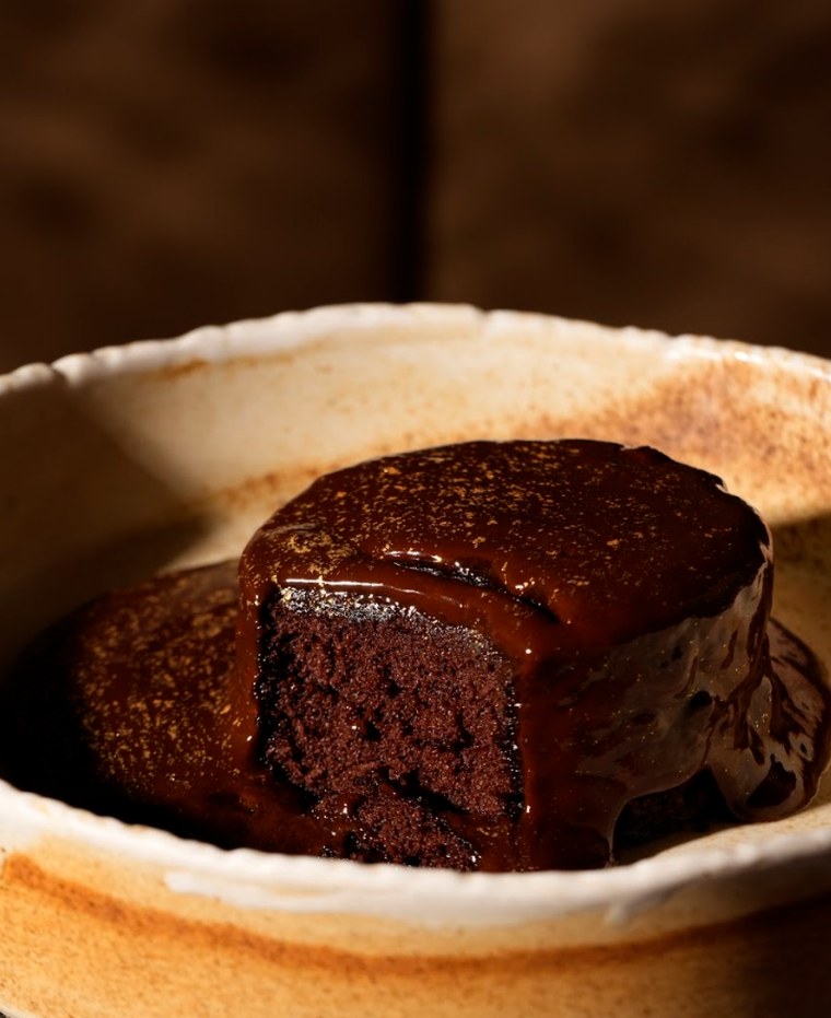 24 Carat Chocolate Cake in warm chocolate glaze